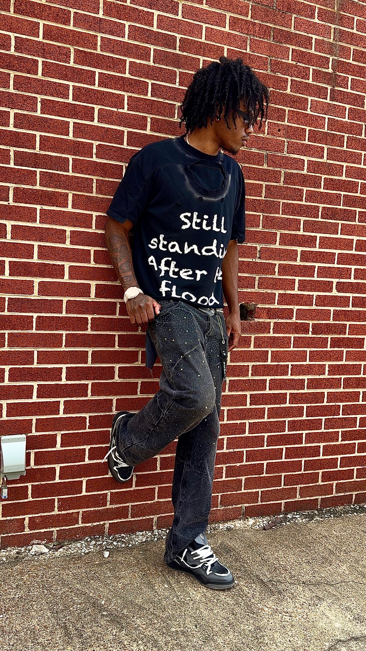 Still standing tee
