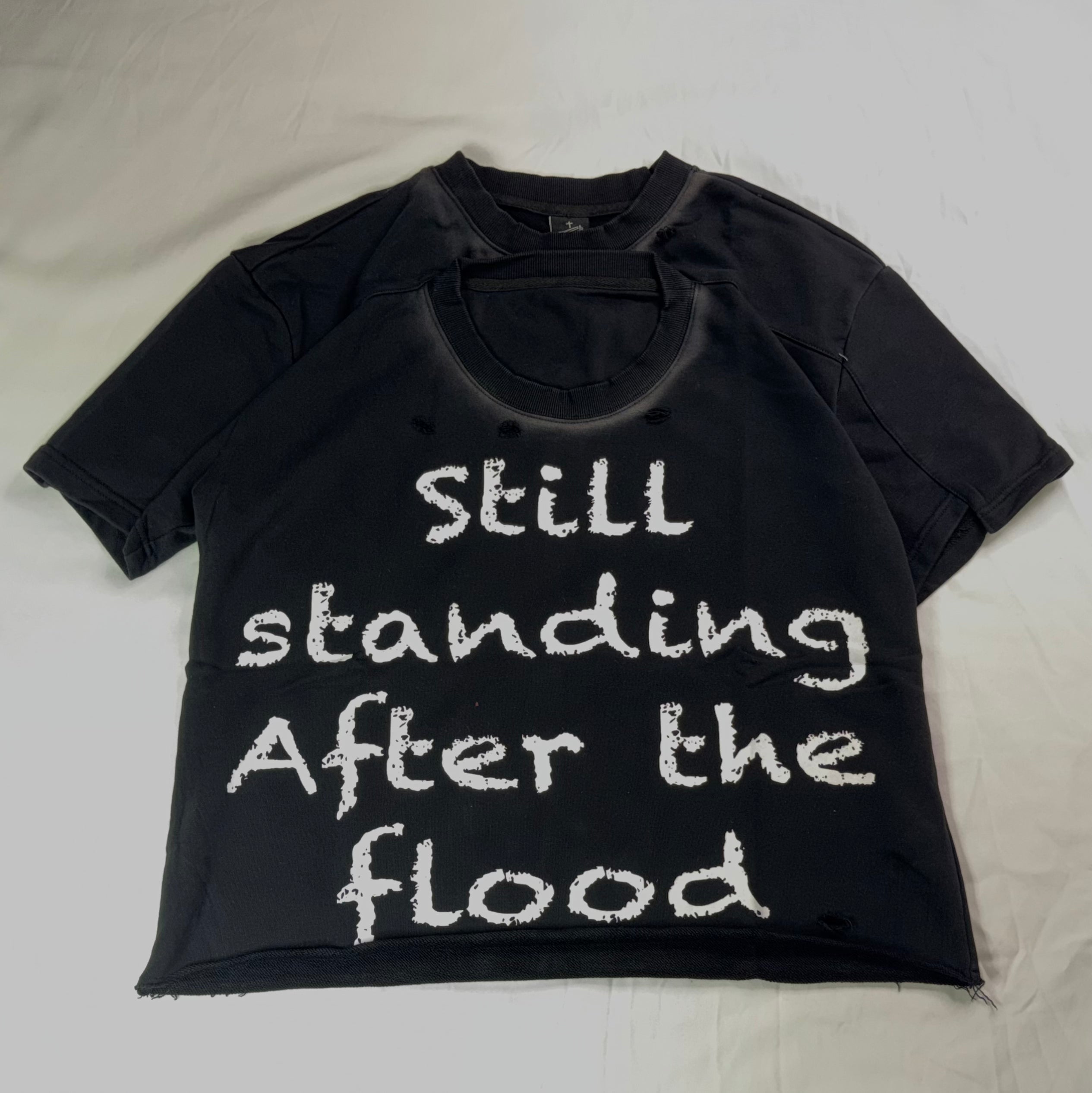 Still standing tee